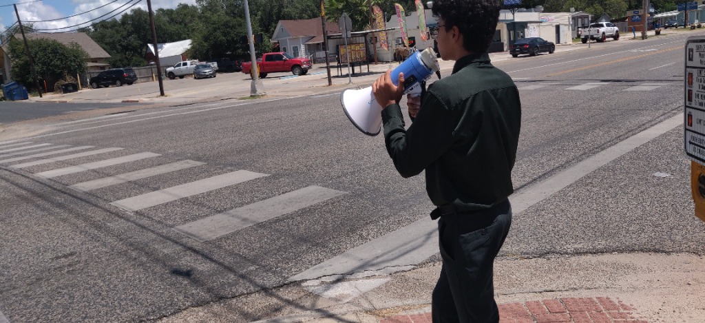 Member sharing the Gospel on the streets of Beeville